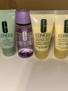 Clinique 4pc Skin Care Travel Set 7-Day Scrub Cream,Take The Day Off & 2 Lotions